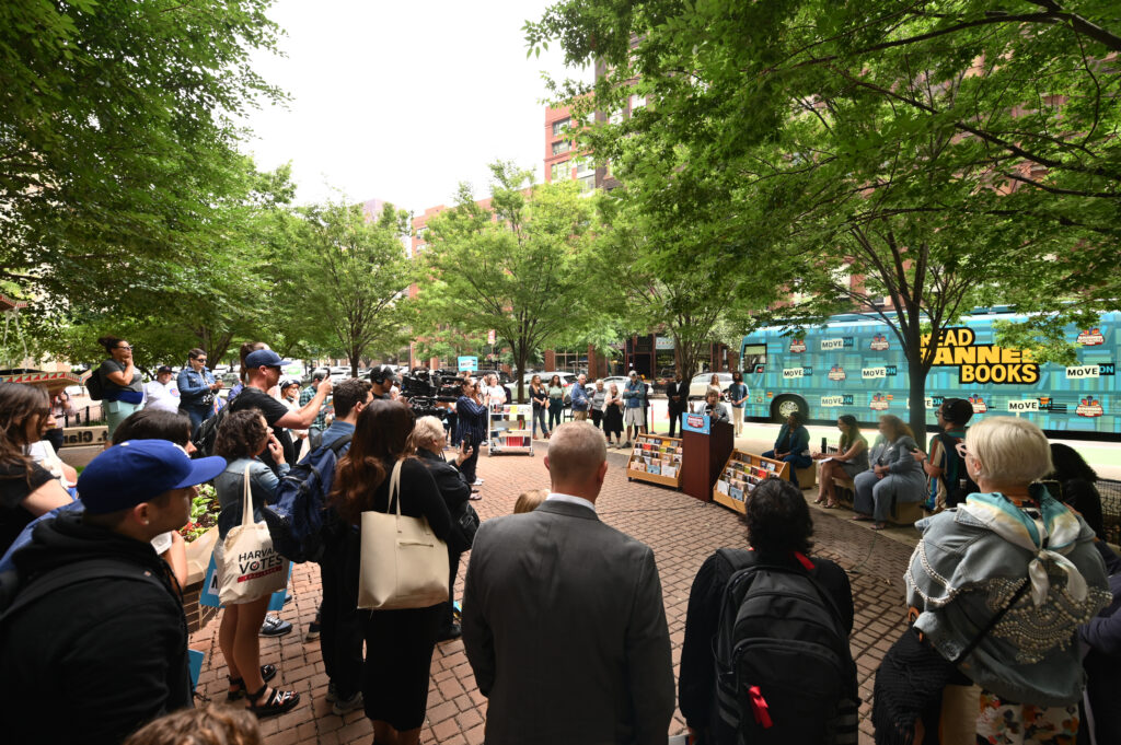 Crowds gather around American Federation of Teachers President, Randi Weingarten, at MoveOn's Banned Bookmobile at Printers Row Park by Sandmeyer's bookstore in Chicago, Illinois.