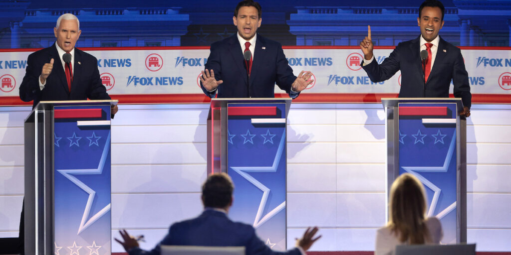 GOP Candidates Mike Pence, Ron DeSantis, and Vivek Ramaswamy face off at the Republican National Committee Debate in Milwaukee, WI.
